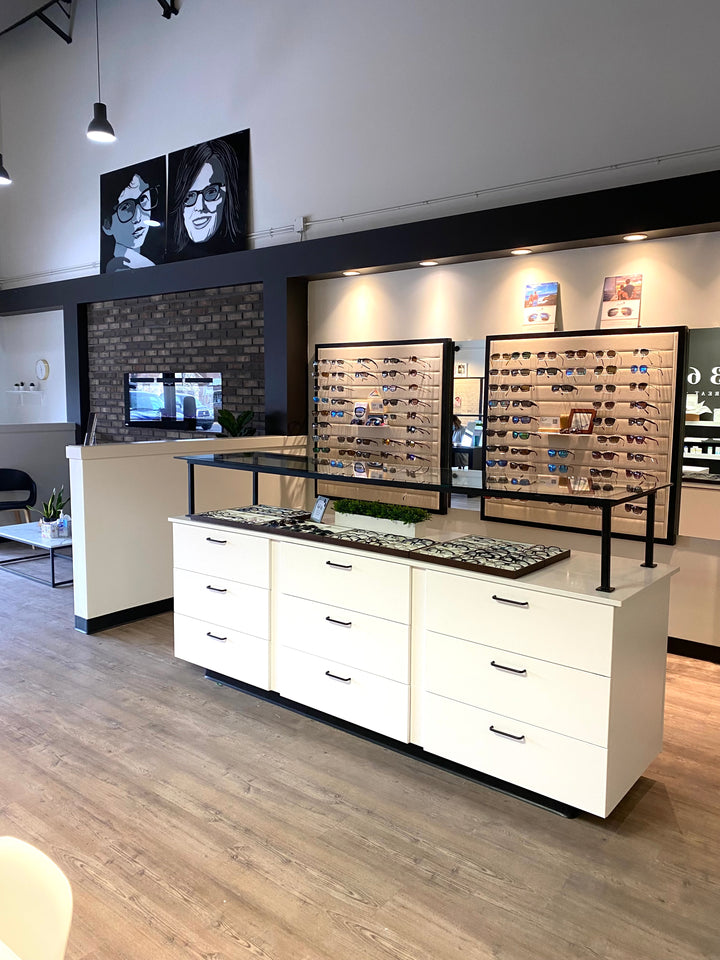 Okotoks Eye Doctor. Eyes 360 display, Maui Jim Sunglasses, Oakley Sunglasses.